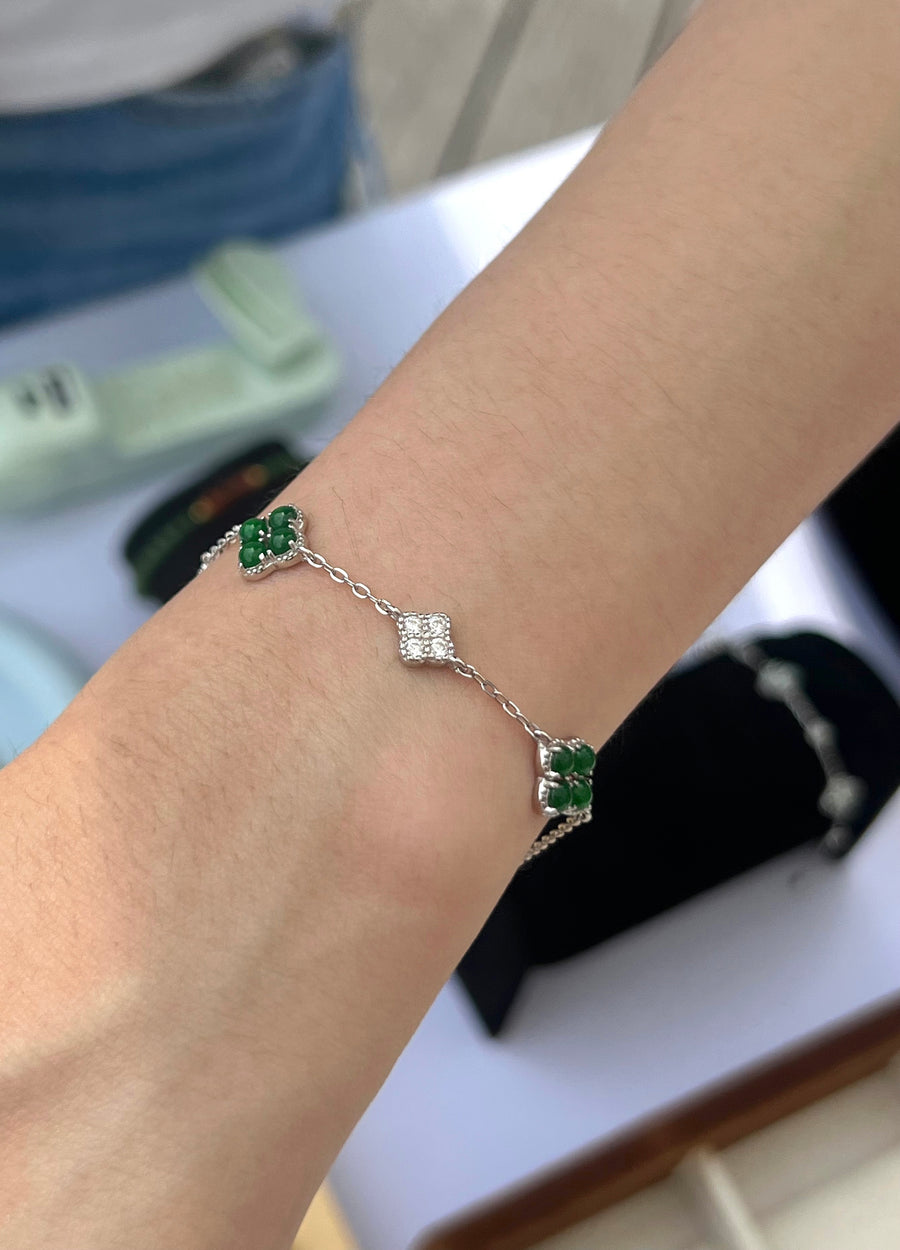 Customer wearing a green jadeite clover bracelet