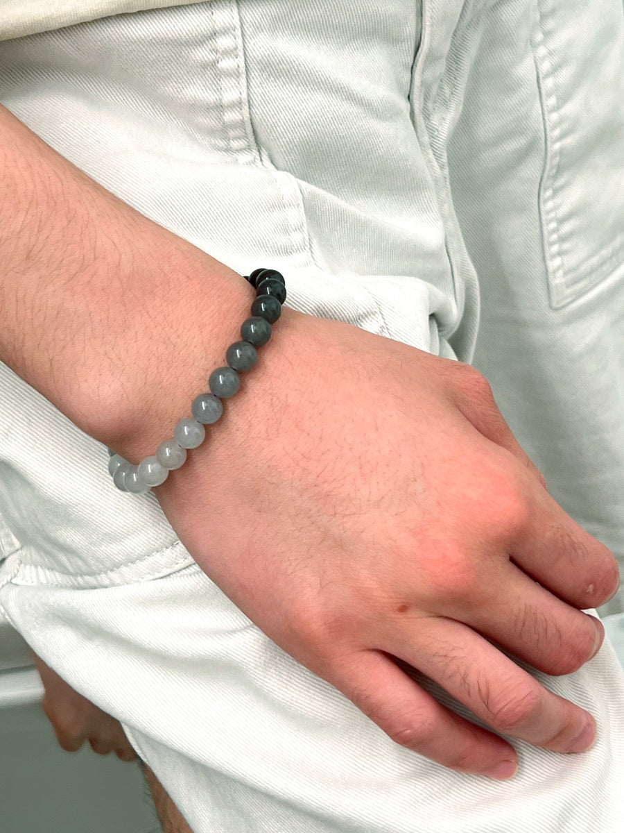 Customer wearing a grey gradient jade bead bracelet