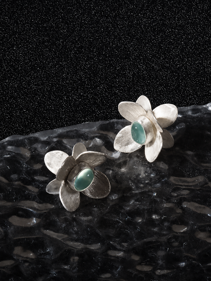 Made by our founder for her best friend of nine years. Set in silver and jade, because some summers never end.